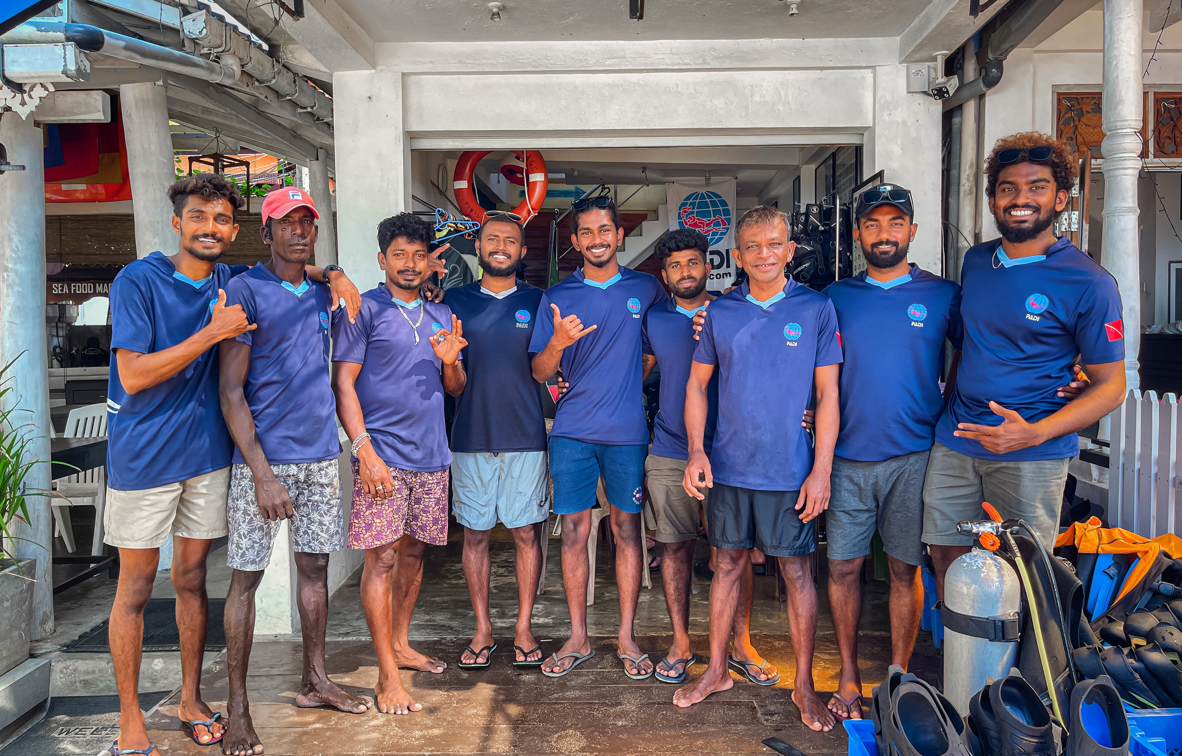 The Seahorse Dive Center team outside the dive center in Unawatuna